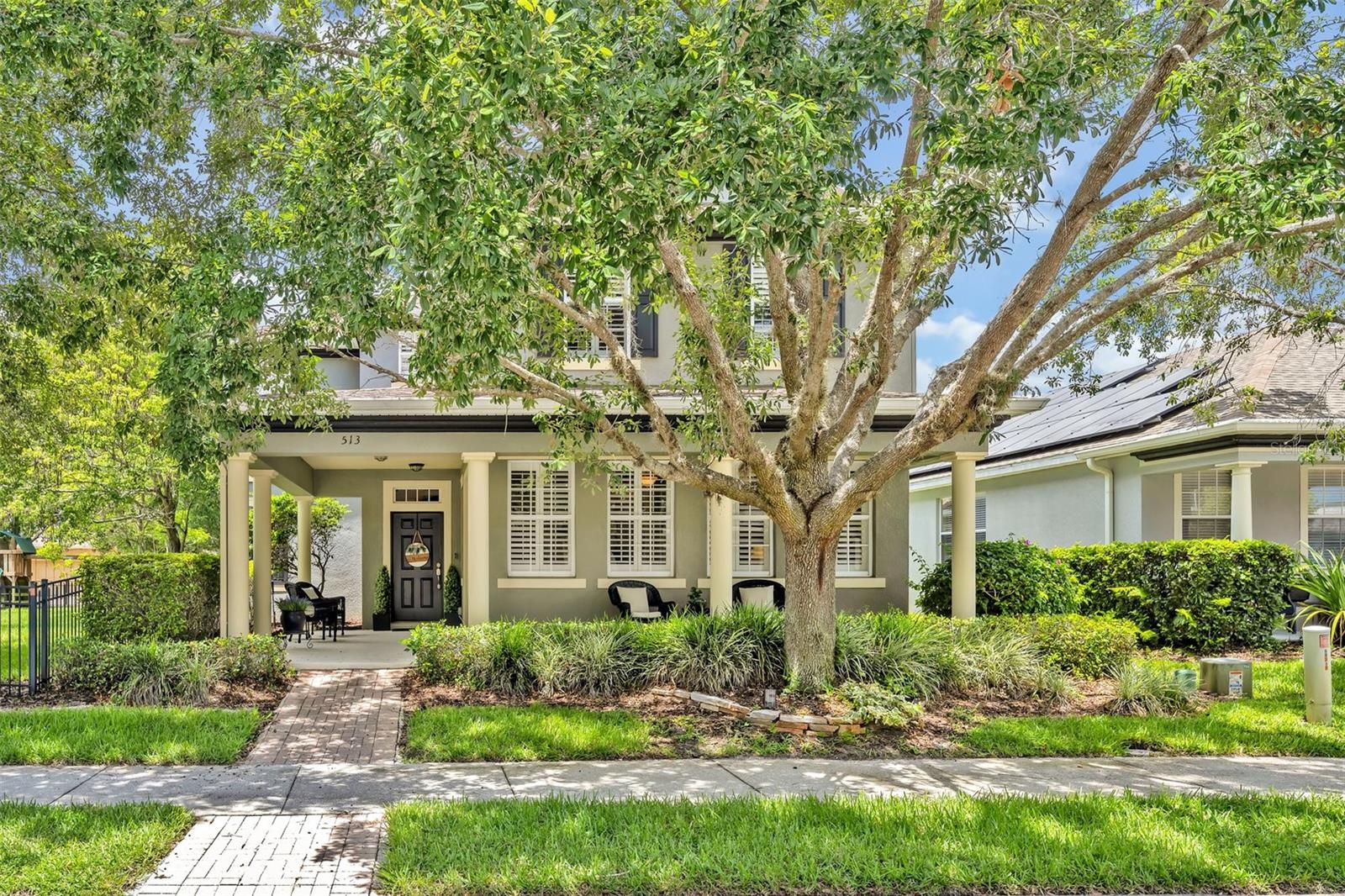 Your Dream Home is Here! Back on the market buyer lost financing. Fabulous Spacious home in desirable Legacy Park. Situated on a 1/3 acre, the Largest Lot in the community, this Gorgeous Home has Charm Galore with a Front Wrap Around Porch and loads of Curb Appeal! New Roof and New A/C on 2nd floor. Recently installed 2025 Hot Water Heater. This Home features an expansive Floor Plan that includes 4 Extra Large Bedrooms, 2.5 Bathrooms and all the Space you could want for entertaining! Inviting Foyer leads to the Formal Rooms with Gorgeous double sided Stone Fireplace between the Dining Room Living Room, Crown molding and Wood Laminate Flooring throughout the entire first floor, along with Volume ceilings will impress. The Substantial sized Kitchen which overlooks a stunning Family Room gives an inviting open feeling. Featuring an abundance of 42” Cabinets with Crown Molding, an Island, Snack Bar, Coffee Bar with Wine Rack, Desk and Ceramic Tile Backsplash, it’s a fabulous Cooking and Gathering space. The extra-large Family Room opens to a lovely Screened Back Patio. If a Big Backyard is on your wish list, look no further. The immense yard, Fully Fenced offers extra Privacy and the HOA maintains it! All of the windows throughout the home have beautiful Plantation Shutters. Upstairs features 4 bedrooms and 2 full Bathrooms. The Primary En-Suite is Oversized and includes a Walk-In Closet, a Sizable Bathroom with Double Sinks, Shower and separate Tub. The other 3 bedrooms are oversized with generous sized closets and the rooms can accommodate plenty of furnishings! The Attached Garage is smartly tucked at the back of the house offering convenient access for unloading groceries. Legacy Park with close proximity to Shopping, Highways, Schools and Houses of Worship offers great amenities including Lawn Care, a Community Pool and Playground. No need for a lawnmower. Relax & enjoy your time at home!