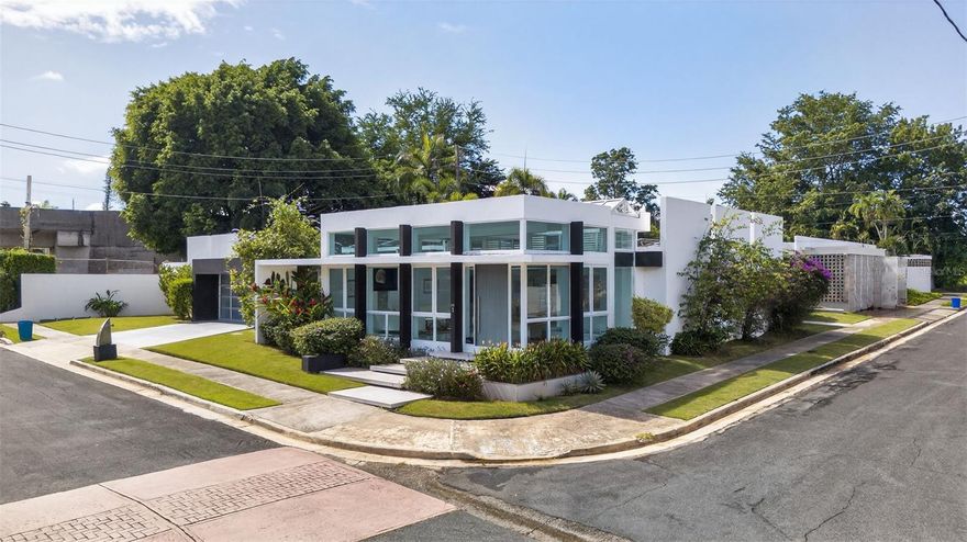 Stunning fully remodeled residence in one of Guaynabo’s most sought-after neighborhoods. Bright, expansive interiors with contemporary finishes and a gourmet kitchen loaded with premium appliances. The striking outdoor area—complete with a modern pool and manicured garden—is perfect for entertaining. An exceptional home for discerning families seeking comfort, style, and privacy.

Property Highlights:

- Sale Price: $2,250,000
- 4 Bedrooms
- 4.5 Bathrooms
- Approx. 3,664 sq.ft of living area 
- Approx. 809.09 sqm lot (corner lot)
- Fully renovated home
- Entrance foyer with plenty of natural light 
- Fully equipped kitchen
- Laundry room
- Private family room with powder bathroom
- One bedroom with hallway bathroom
- Two bedrooms with jack and Jill bathroom
- Ample owner’s suite with walk-in closet
- Spacious and covered terrace with outdoor kitchen 
- Sleek modern pool
- Landscaped garden and outdoor entertaining areas
- 2-Car garage with enlighten EV car charger
- Solar PV system and emergency power generator 
- 600 gals water cistern and 30 gallons solar water heater
- Automatic patio irrigation system
- Low voltage lighting for patio and paved areas
- Year built: approximately 1960’s
- CRIM: $4,311.01/ year
- HOA: $300 /month
- Zoning R-B [former R-1]