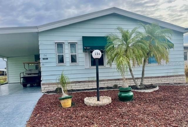 Beautifully Turn-Key Furnished + golf cart.....2 Bedroom/2 Full Bath home in Gold Tree Community! It is one of the few homes that become available with the pond view and only steps away from the Clubhouse/Pool area. A brand-new roof was installed with an enclosed lanai/Florida Room this year and A/C new in 2023! Great open floorplan with Living Room/Dining Room/Kitchen combination. There are many updates throughout and built in features including a small bar area off the Dining room & vaulted ceilings. The enclosed Florida Room will have a door walking out to the deck over looking the pond....A great place to enjoy your morning coffee! Gold Tree has lots of activities listed in your monthly newsletters and great neighbors to enjoy them with. It is a gated community with gates closed from 6pm to 6am daily. It has an on-site storage yard where you can keep your campers, boats or RV's. Gold Tree is conveniently located to shopping, eateries, banking, hospitals, UTC Mall, Benderson Park, Riverwalk, airport, I-75 and best of all our beautiful beaches always rated among top beaches in the U.S. Association says 55+, pets welcome and rentals allowed. Welcome Home!