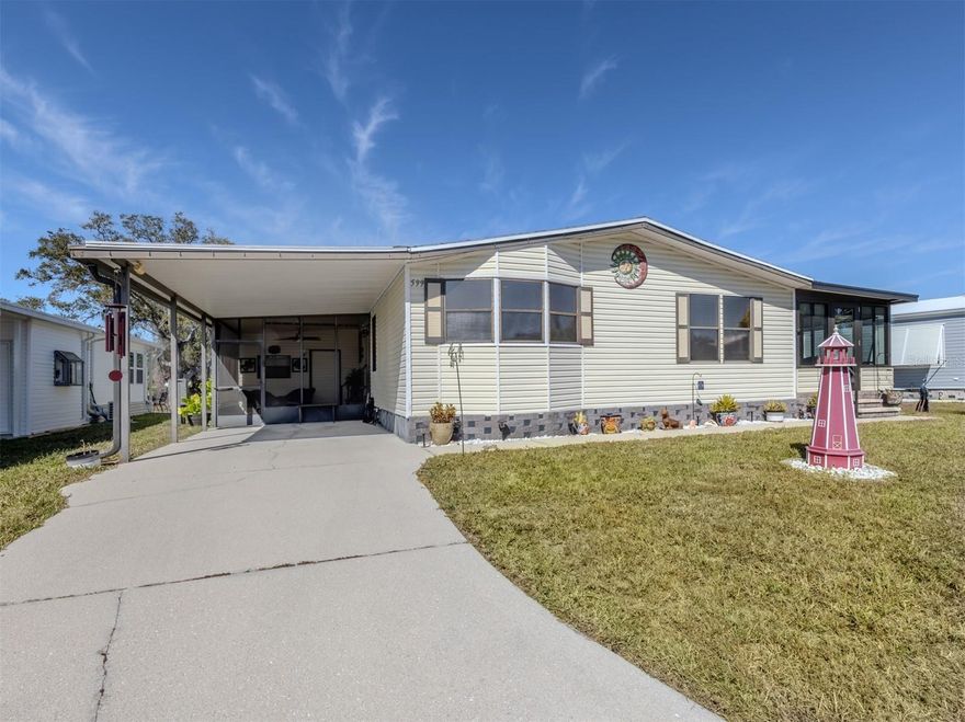 This extremely spacious and immaculate manufactured home is perfectly positioned on a peaceful preserve lot in the highly desired, pet friendly, land owned community of Harbor Isles. The show-stopping kitchen is sure to impress, featuring gorgeous epoxy countertops, stainless steel appliances, and a beautiful tile backsplash, all open to an inviting, light-filled living area. Vaulted ceilings, luxury vinyl flooring throughout, and abundant natural light create an airy, welcoming feel in every room. Just beyond the living room is a completely remodeled Florida room with sliding acrylic windows, tile floors, and a mini split AC, making it a comfortable space to enjoy year-round.
Both oversized bedrooms offer generous walk-in closets, while a versatile bonus room at the entryway provides the perfect spot for a home office, hobby room, or laundry area. Outdoor living is just as appealing with a lovely screened lanai on the side of the home and an extra-large storage shed for all your needs. A shingle roof completed in 2023 adds peace of mind, making this home truly move-in ready for its next owner.
Harbor Isles is a vibrant 55+ community nestled along the Myakka River, known for its resort-style amenities and active lifestyle. Residents enjoy a marina, clubhouse, pool, pickleball and tennis courts, and a full calendar of social activities, all within a beautifully maintained, land-owned setting. This is Florida living at its best, combining comfort, community, and a serene natural backdrop.