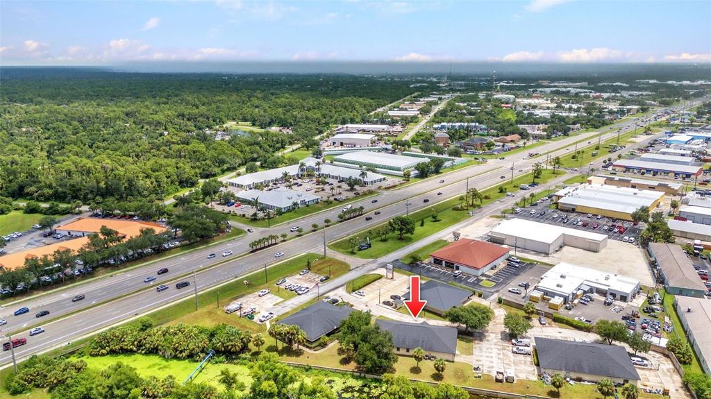 Photo of 983 Tamiami Trail, Port Charlotte, FL 33953 (MLS # C7512982)