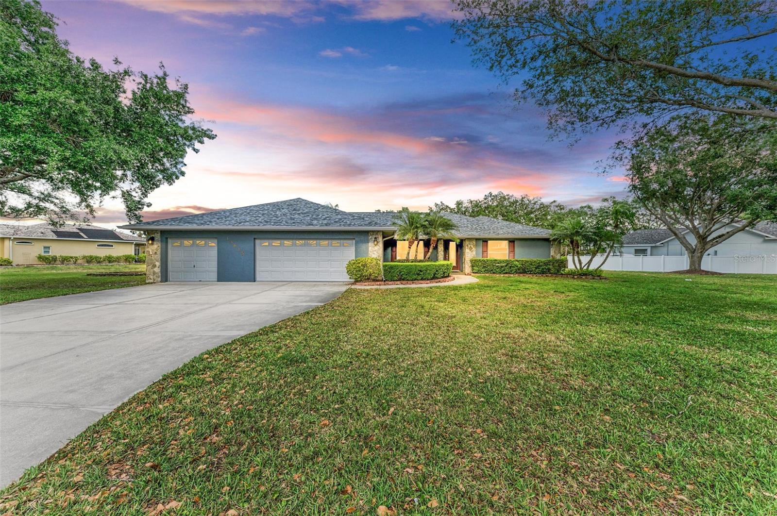 Executive pool home with 5 Car Garage + Attached In-Law Suite now available! Spanning over 3,400sqft, this custom pool home sits on 0.78 acres in the highly desirable Mill Creek community and boasts an attached in-law suite that also makes a great game room, plus an oversized 3-car attached garage AND an additional detached 2-car garage. Enjoy vaulted ceilings and a large family room that seamlessly connects to the dining room and kitchen with French doors opening to the pool. The newly renovated kitchen spans 27ft and is complete with custom cabinetry, a massive center island, stainless-steel appliances, stone counters, walk-in pantry, informal dining area and storage galore! The primary suite offers a private sanctuary with spacious dual closets and direct access to the sparkling pool. The spa-like ensuite bath features a new vanity with dual sinks, a garden tub for relaxing, walk-in shower and door leading to the laundry room for added convenience. Two additional bedrooms sit on the opposite side of the house, both with walk-in closets, and sharing a guest bathroom with a newly updated vanity. The office/den could be used as a fourth bedroom and features wall cabinets for storage. On the back of the house sits a huge game room that boasts a wet-bar/kitchenette, French doors that open to the screened pool area, a third full bathroom with pool access and a pool table. The fully screened pool area spans the entire rear of the home, connected to both the additional 2-car garage/workshop and to the game room/in-law suite. The pool is saltwater and heated with a relaxing spa. The attached 3 car garage is oversized and features air conditioning, electrical, large sink, running water, and a storage closet in the 3rd bay. The additional, detached 2-car garage also features AC, electrical, and water plus includes an additional large room on the back that could be used for storing holiday decorations, business supplies, or made into an office. Additional features of this home include new luxury vinyl plank flooring, new paint, new roof 2020, whole-home generator that powers the house during outages, solar heat for the pool, fenced-in area in the backyard for pets, and a spacious laundry room. Landlord covers pool service and lawn care. The community of Mill Creek is coveted for its private, oversized lots and outstanding schools. I invite you to come explore this truly one-of-a-kind home!