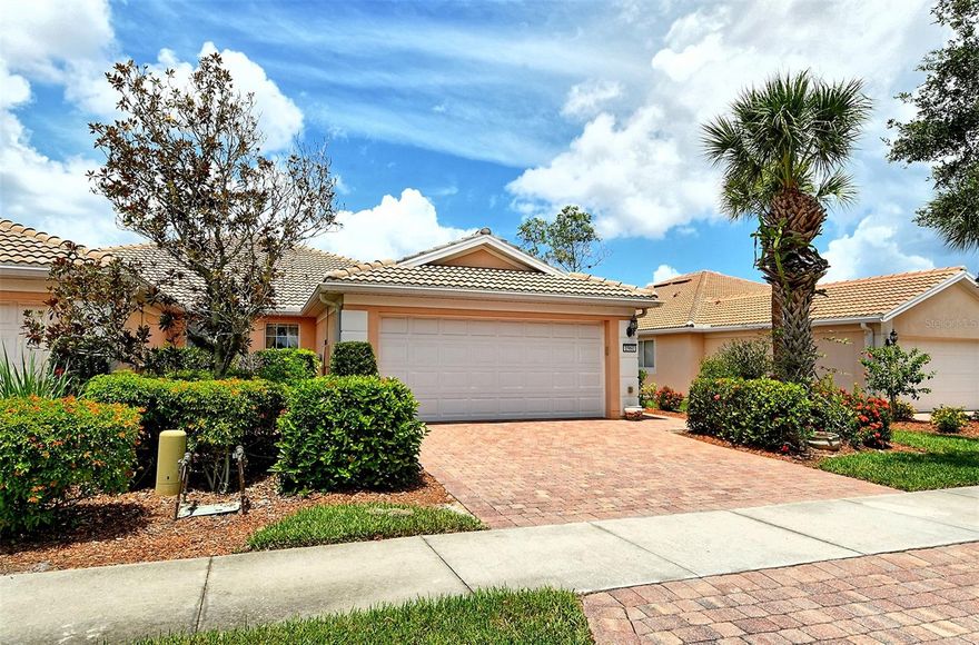 Immaculate,  fully furnished & decorated paired maintenance free villa in The Isles of Palmer Ranch. 3 bedrooms, 2 full baths with an open great room floor plan. Neutral tile in main living areas. Kitchen features wood cabinets, solid surface counters & stainless appliances. Extended paver brick lanai overlooks a private pond. New AC. Beautifully furnished & decorated with Tommy Bahama style. Hurricane shutters throughout for lower insurance. Maintenance fee covers all landscaping, irrigation system & maintenance of the system with access to the resort style amenities. Community features resort style amenities: heated pool, tennis, fitness center, clubhouse , bocce court & playground* Located on Popular  Palmer Ranch near world famous Siesta Key Beach,  shopping, golf, restaurants, Legacy Bike Trail, YMCA & easy access to I-75