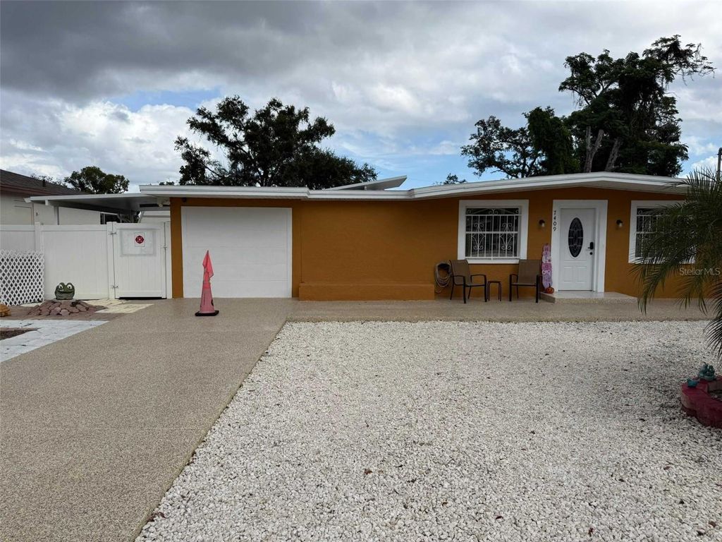 Photo of 7409 N Tampania Avenue, Tampa, FL 33614 (MLS # TB8445260)