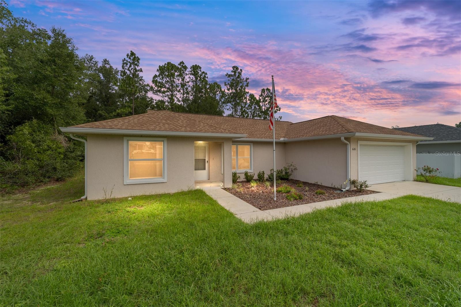 Location! Location! Unit 10 in Marion Oaks North. Spacious 3-bedroom 2-bath concrete block home with all appliances included! Enjoy an open floor plan, split bedroom layout, tile floors throughout living area, and a convenient inside laundry room. Step outside to a fenced backyard with a shed-perfect for storage or hobbies. 100% FINANCING USDA APPROVED! NO HOA! Fantastic location with great schools, shopping, dining, walking/biking trails and medical facilites nearby.