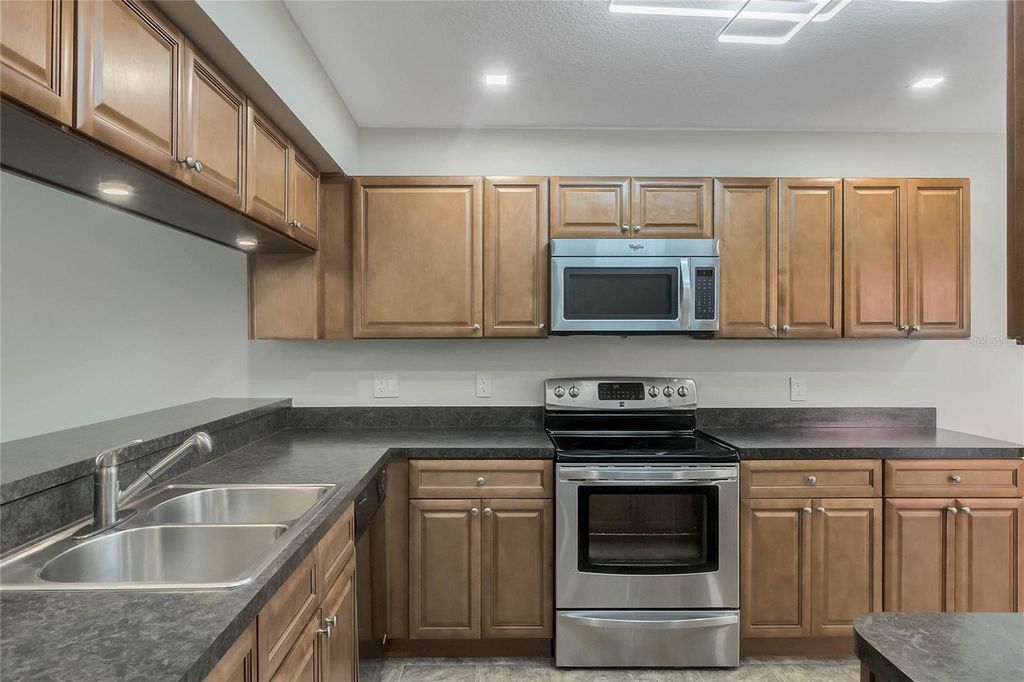 Photo of 8235 Ambrose Cove Way, Orlando, FL 32819 (MLS # O6392217)