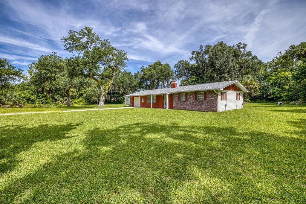 Photo of 585 Corbin Park Road, New Smyrna Beach, FL 32168 (MLS # NS1088518)