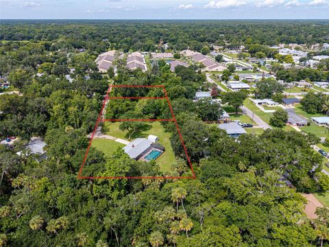 Photo of 585 Corbin Park Road, New Smyrna Beach, FL 32168 (MLS # NS1088518)