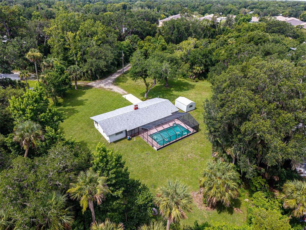 Photo of 585 Corbin Park Road, New Smyrna Beach, FL 32168 (MLS # NS1088518)