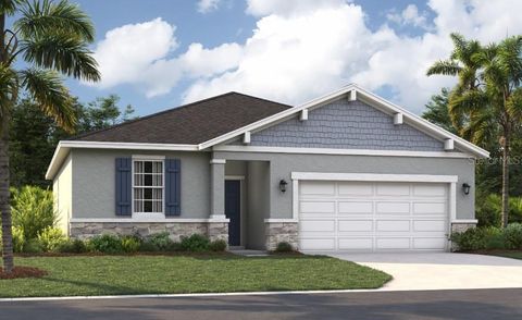 Photo of 937 Pearlwood Loop, Eagle Lake, FL 33839 (MLS # O6405145)