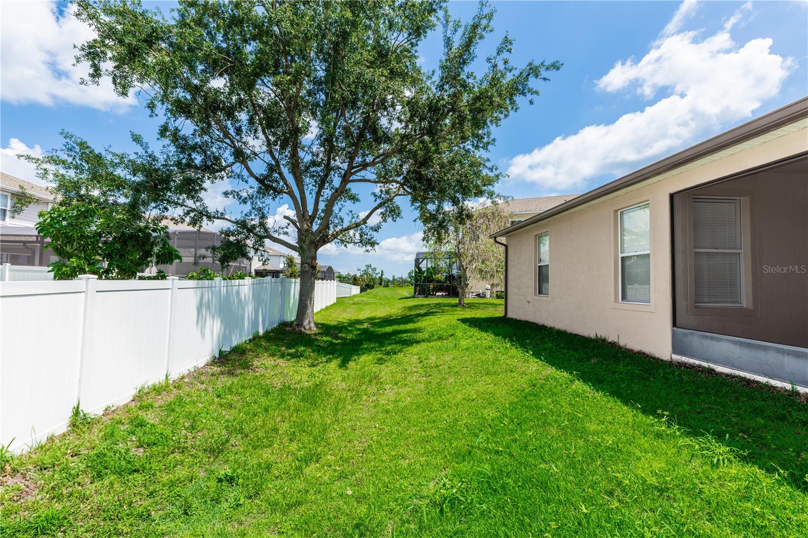 Welcome to your new home in the desirable Lakes of Windermere community. This beautiful 3-bedroom, 2-bathroom house includes a large private office that can be easily converted into a 4th bedroom. It boasts a covered screened lanai and a 2-car garage. Freshly painted inside and out, with a new roof, sod, and landscaping in the front yard, this home is move-in ready. All three bedrooms have new vinyl flooring and tile throughout the rest of the home. Enjoy A-rated schools, proximity to Disney, fine dining and shopping, and extensive community amenities, including a pool, playground, dog park, tennis courts, sand volleyball, sports field, and a dock with gazebo. Schedule your showing
