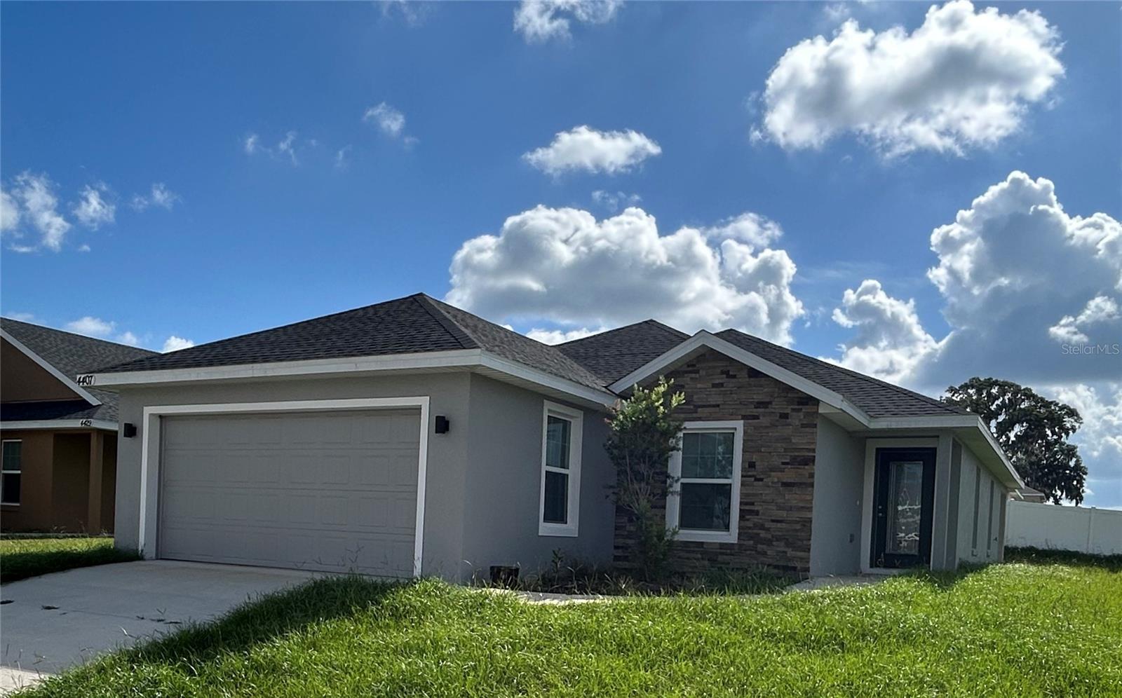 Experience the pinnacle of comfort and convenience in this stunning, like-new (built 2024) rental home located within the sought-after, gated community of St. James Park. This immaculate 3-bedroom, 2-bathroom residence boasts 1,359 square feet of thoughtfully designed living space, perfect for families and professionals alike.
Step inside to discover a bright and airy living room, featuring sliding glass doors that seamlessly extend your living space to a relaxing covered back porch – ideal for entertaining or unwinding after a long day. The heart of the home is a chef-inspired kitchen, complete with sleek granite countertops, stainless steel appliances, and a convenient pantry for ample storage. Retreat to the spacious master bedroom, featuring a generous walk-in closet and ceiling fan/light fixture for added comfort. Enjoy the convenience of an inside laundry room and a 2-car garage, providing ample space for vehicles and storage.