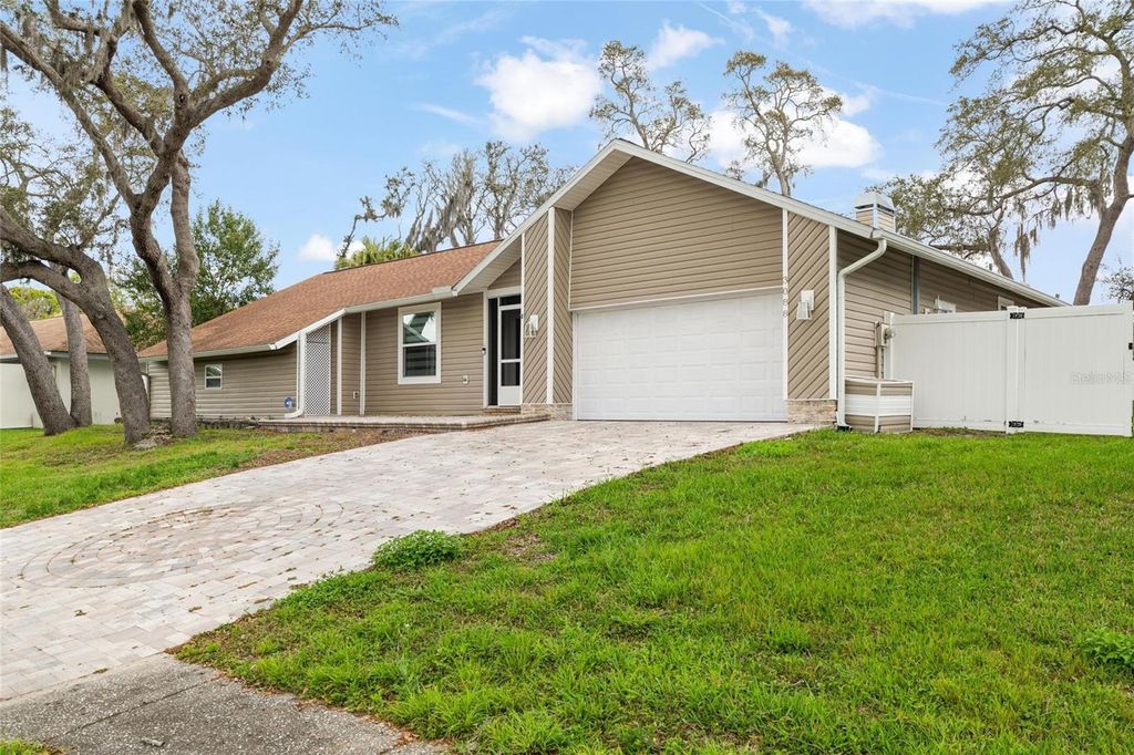 Photo of 3088 Enisglen Drive, Palm Harbor, FL 34683 (MLS # TB8485535)