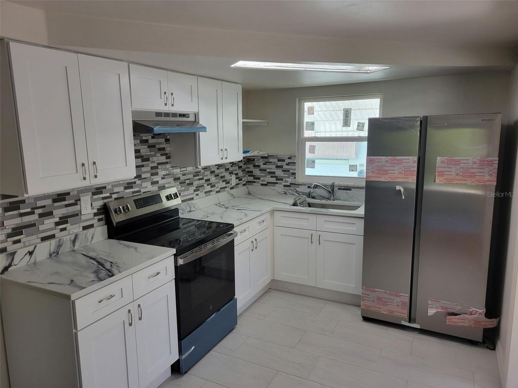 Photo of 3433 Atlantis Drive, Holiday, FL 34691 (MLS # TB8499621)