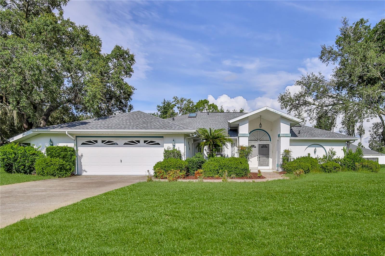 Welcome to this beautifully designed 3-bedroom, 3-bathroom, pool home offering a desirable split floor plan and generous living space on a .49-acre lot. A double-door entry invites you into a bright and open living room and dining area, with vaulted ceilings, seamlessly connected to the kitchen—perfect for entertaining. The kitchen is thoughtfully appointed with two pantries, two skylights, a ceiling fan, and a cozy breakfast nook with sliding glass doors leading to the lanai.
Enjoy effortless indoor-outdoor living with additional sliding glass doors from the living room and primary suite, all opening to the covered and screened lanai with a refreshing pool, outdoor kitchenette, shower, and plenty of room to relax or host guests.
The spacious primary suite features two walk-in closets and a luxurious en-suite bath complete with a jetted tub, separate shower, and dual-sink vanity. Bedroom two includes a large walk-in closet, while bedroom three offers two closets—ideal for storage or flexible living. The guest bath includes a tub and shower combo with a linen closet, and the separate pool bath features a walk-in shower for convenience.
Additional highlights include an inside laundry room with washer, dryer, utility sink, and cabinetry, surge protector, plus a 2-car oversized garage. Major updates include a new roof (2024) and HVAC system (2025)—giving peace of mind for years to come.
Don't miss the opportunity to own this move-in ready Florida home with all the right features—schedule your showing today!