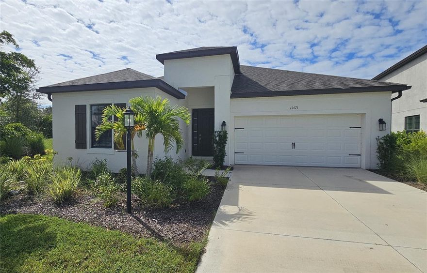 Located in the highly desirable Skye Ranch community, this unfurnished, move-in ready single-family home features 4 bedrooms plus a den and 3 bathrooms, combining comfort, style, and convenience in one perfect package. Featuring the popular Antigua floor plan, this spacious single-story residence offers soaring ceilings, an open-concept layout ideal for everyday living and entertaining, and a gourmet kitchen with a large center island, granite countertops, stainless steel GE appliances, a walk-in pantry, and gas cooktop. The versatile den provides the flexibility for a home office, hobby space, or playroom, while brand-new carpet has just been installed in all bedrooms and the flex room. A light-filled living area seamlessly connects to the covered lanai, where you can relax and enjoy peaceful private views of the lush greenbelt and walking path behind the home. As part of Skye Ranch, residents have access to The HUB, a resort-style amenity center featuring a pool and spa, Junior Olympic pool, splash pad, locker rooms, fitness and movement studios, basketball court, rock climbing wall, demonstration kitchen, and café, as well as extensive outdoor recreation including nature trails, dog parks, playgrounds, sports fields, sand volleyball, tennis, pickleball, and a community firepit area. A brand-new K–8 school is also being built right in the neighborhood, and with a prime location just east of I-75, this home is close to top-rated schools, shopping, dining, healthcare, cultural attractions, and only 25 minutes from the world-famous Siesta Key Beach.