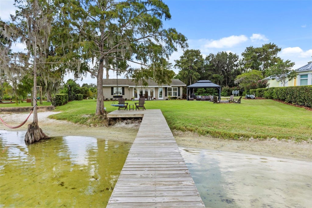 Photo of 10430 Lake Cottage Lane, Orlando, FL 32836 (MLS # O6431032)
