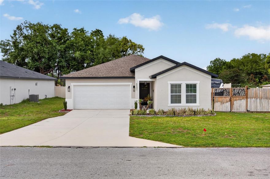 For a limited time, buyers who finance through the seller's preferred lender can take advantage of a lender-paid 1-point rate buydown — a great opportunity to lower your monthly payment from day one. Built in 2023, this move-in-ready home in Orange Blossom Hills delivers the best of Central Florida living — quality construction, thoughtful upgrades, and a backyard built for entertaining. All at no HOA.
Inside, 9-foot ceilings and luxury vinyl plank flooring set a bright, open tone throughout. The kitchen is the heart of the home, featuring quartz countertops, a tile backsplash, soft-close cabinetry, stainless steel appliances, and a large walk-in pantry. Storage is plentiful throughout — from the abundant closets in every bedroom to the custom built-ins that keep everything organized and close at hand. The spacious primary suite offers dual quartz-topped sinks, a large walk-in shower, a generous walk-in closet, and a stylish shiplap accent wall. Two additional bedrooms share a convenient Jack-and-Jill bath with large linen closet in a smart split floor plan.
The outdoor space is a true standout. Cool off in the above-ground pool, set half in-ground and wrapped in a custom deck with built-in seating. Relax or host under the screened lanai, gather around the fire pit on cooler evenings, or take advantage of the fully fenced, professionally landscaped yard with an irrigation system and new heads.
Practical extras include a 2-car garage with additional storage space, indoor laundry, RV parking with hookups and a pump-out station, and a brand-new Lennox HVAC system (2025). Solid concrete/block/stucco construction means low maintenance for years to come.
Location is unbeatable — shopping, dining, medical facilities, and The Villages are all golf-cart accessible right off Hwy 42. Don't miss this limited-time financing opportunity — schedule your private showing today.