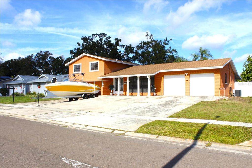 Photo of 8309 W Elm Street, Tampa, FL 33615 (MLS # TB8404069)