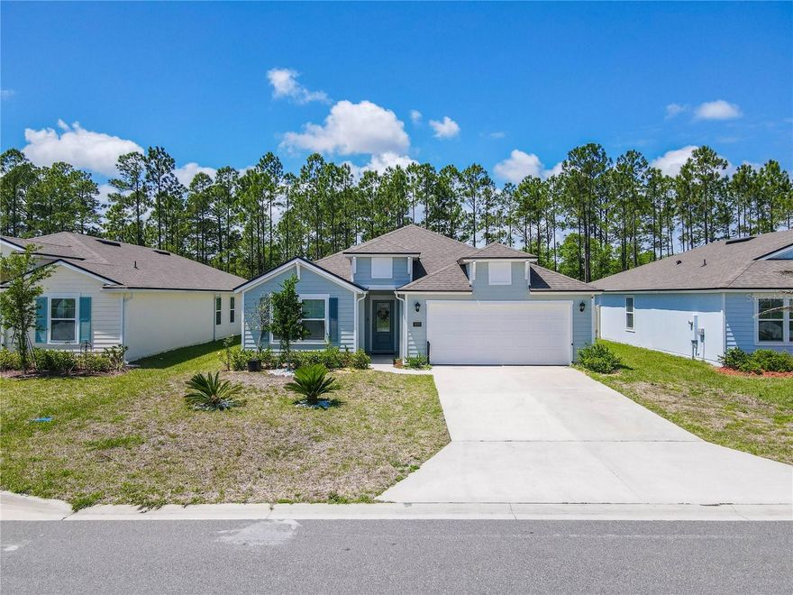 Your tropical dreams can now become your reality! Lovely Home in St. Augustine located at Dorado part of Entrada gated community. This beautiful home features an open concept, 4 bedrooms, 3 bathrooms, a lot of upgrades and equipped with natural gas. The heart of the home features a spacious kitchen with a big island, upgraded stainless steel deep kitchen sink, upgraded faucets, quartz countertops, and plenty of storage, ideal for entertaining family and friends. Primary suite has a tray ceiling and crown molding complete with a luxurious en-suite bath and generous closet space. Enjoy Florida outdoor living with a screened-in lanai, perfect for morning coffee or evening relaxation. The backyard offers plenty of room to unwind and privacy. Community offers resort-like amenities, including pool, fitness center, clubhouse, playgrounds, and more. YOU MUST SEE! Schedule your showing today!