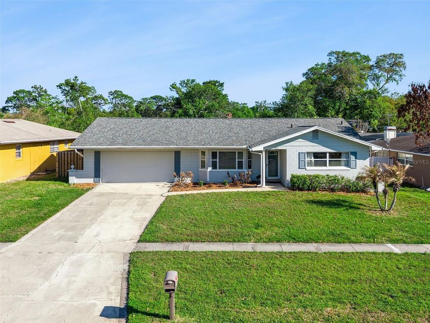 Welcome to this beautifully updated 3-bedroom, 2-bath home in the highly desirable Spring Oaks community—a prime location in the heart of Central Florida known for its convenience, connectivity, and family-friendly lifestyle. With an optional HOA, you’ll enjoy added flexibility in a peaceful, established neighborhood. Step inside to discover a bright, open-concept split floor plan designed for both everyday comfort and entertaining. The spacious family/living room combination offers nearly 400 sqft. of wide-open living space, filled with crown molding & natural light and perfect for gatherings, relaxing evenings, or hosting guests. The stylish galley kitchen checks every box featuring abundant counter space, ample cabinetry, stunning waterfall granite countertops, stainless steel appliances, and a window overlooking the fully fenced backyard—ideal for keeping an eye on pets or playtime while preparing meals. Just beyond the kitchen, you’ll find a generous dining area along with a versatile flex space perfect for a home office, playroom, or workout area. This bonus space conveniently connects to the laundry room, garage, and backyard, enhancing both functionality and flow.
The private primary suite offers a peaceful retreat with laminate flooring, a beautifully renovated en-suite bathroom, and a walk-in closet complete with built-in shelving. Two additional bedrooms are filled with natural light and feature ceiling fans and ample closet space, sharing a tastefully updated second bathroom and hall closets. Major system updates provide peace of mind for years to come, including a new roof (2022), HVAC system (2021), all-new ductwork (2025), and a new fence (2025). A transfer switch is also in place for easy generator installation—an invaluable feature for Florida living. Step outside to your fully fenced backyard oasis with brick paver paito and an awesome firepit—perfect for entertaining, relaxing, or enjoying Florida’s year-round sunshine with family and friends. Location is everything, and this home delivers. You’re just minutes from everything that makes Altamonte Springs one of the most sought-after suburbs of Orlando. Enjoy quick access to I-4 (less than 2 miles away), making commuting to Downtown Orlando in under 15 minutes and reaching world-famous theme parks in approximately 30 minutes a breeze. Everyday convenience is right at your fingertips with shopping, dining, and entertainment along SR 434 and SR 436, including Altamonte Mall, Uptown Altamonte—home to community events, concerts, and fireworks—and multiple grocery options like Publix and Costco. For outdoor enthusiasts and active families, you’ll love being just minutes from Westmonte Recreation Center, featuring a zero-entry pool, fitness facilities, sports courts, playgrounds, and more. The nearby Seminole Wekiva Trail offers 14 miles of scenic biking, walking, and running trails, while Wekiwa Springs State Park provides endless opportunities for swimming, kayaking, and exploring Florida’s natural beauty. Zoned for highly rated Seminole County schools, this home is ideal for families seeking both quality education and a strong sense of community. From watching rocket launches right from your backyard to enjoying nearby parks, shopping, and entertainment, this home truly offers the best of the Florida lifestyle. Don’t miss your opportunity to own a move-in-ready home in one of Central Florida’s most convenient and connected locations—schedule your private showing today!