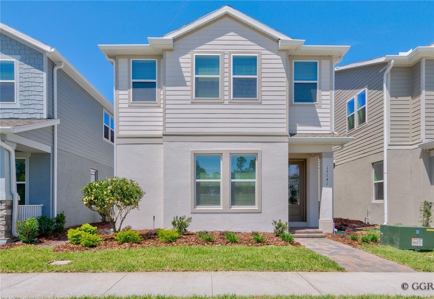 is a newly built single-family home completed in 2024 featuring approximately 2,450 square feet of living space. The property offers 4 bedrooms and around 3.5 to 4 bathrooms, designed with a modern open-concept layout. It includes a spacious gourmet kitchen with a large island, stainless steel appliances, and granite countertops, along with a comfortable living area ideal for entertaining. The primary suite features a walk-in closet and a well-appointed bathroom. The home also includes a two car garage and is situated in a growing community in the Horizon West area, commonly associated with Harvest at Ovation/Summerlake.