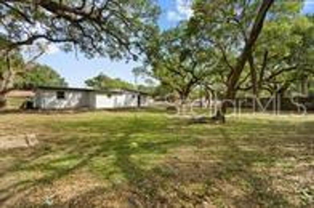Photo of 1923 E Henry Avenue, Tampa, FL 33610 (MLS # TB8436891)