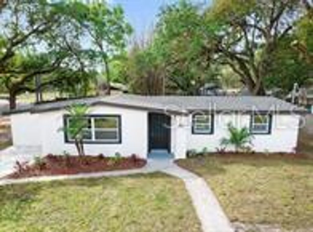 Photo of 1923 E Henry Avenue, Tampa, FL 33610 (MLS # TB8436891)