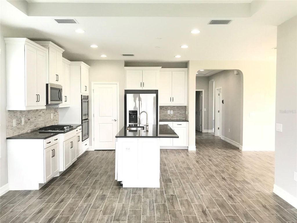 Photo of 4445 Tramanto Lane, Wesley Chapel, FL 33543 (MLS # TB8376147)