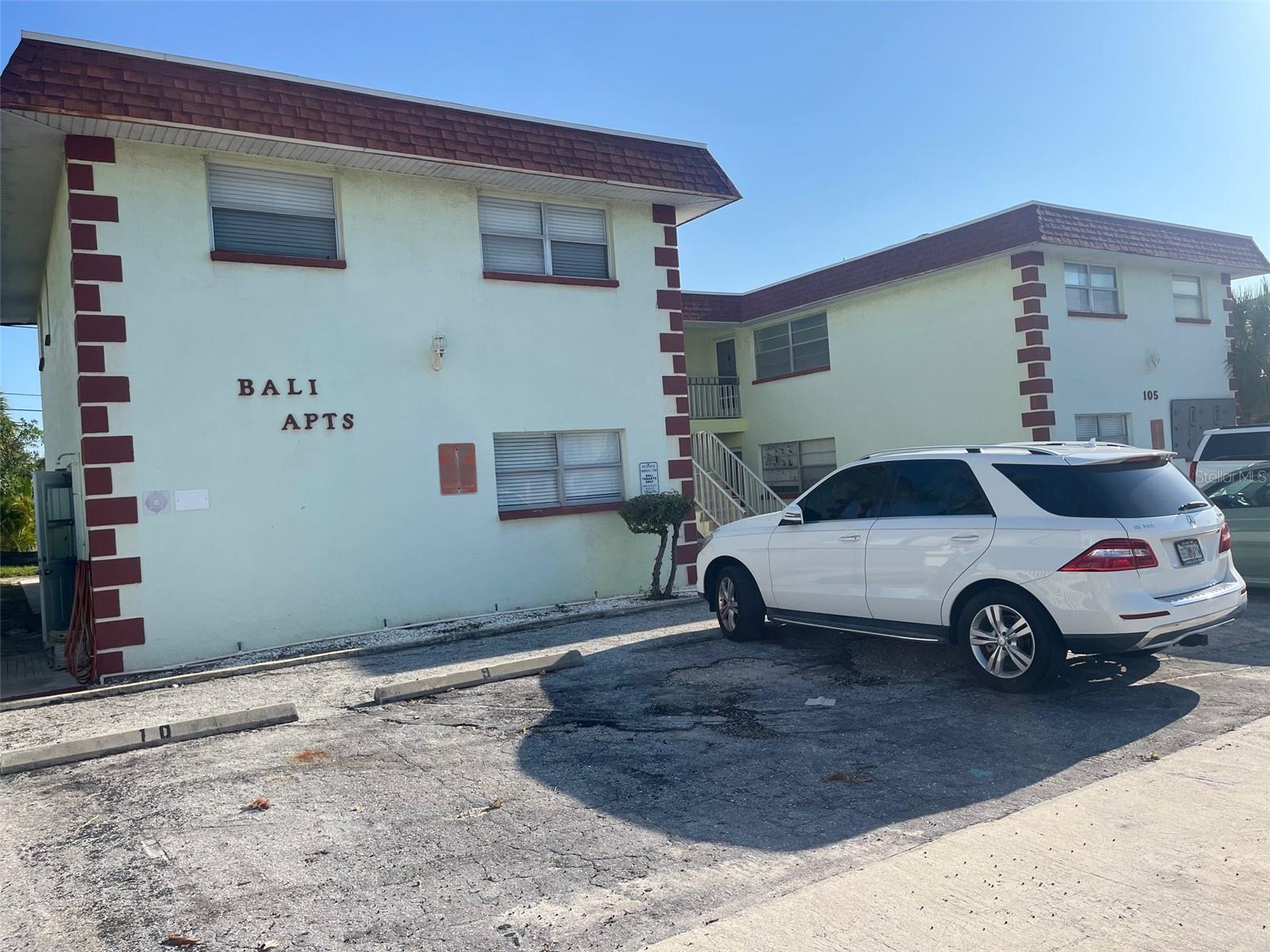 Second floor, corner unit, 2 bedroom, 1 bath apartment, spacious floor plan, walk in closet, new flooring, updated kitchen and bath. Laundry on site, central A/C, assigned parking.
