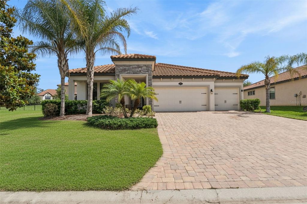 Photo of 1734 Via Lago Drive, Lakeland, FL 33810 (MLS # L4961856)