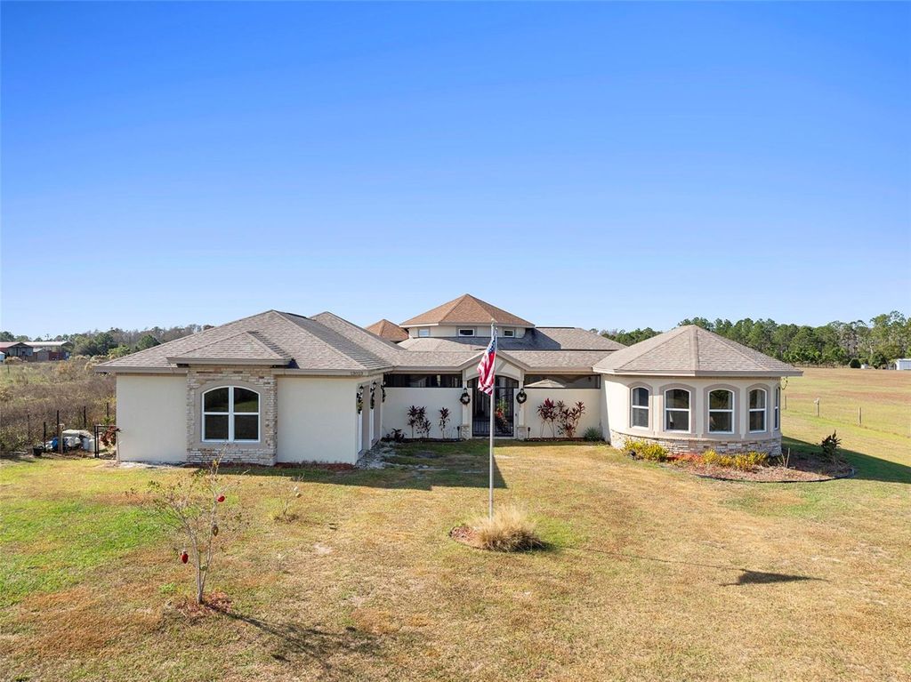 Photo of 13023 Sweet Hill Road, Polk City, FL 33868 (MLS # O6365526)