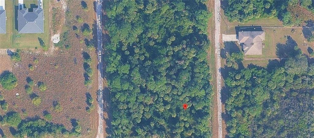 Photo of 510 Palao Avenue S, Lehigh Acres, FL 33974 (MLS # O6449813)