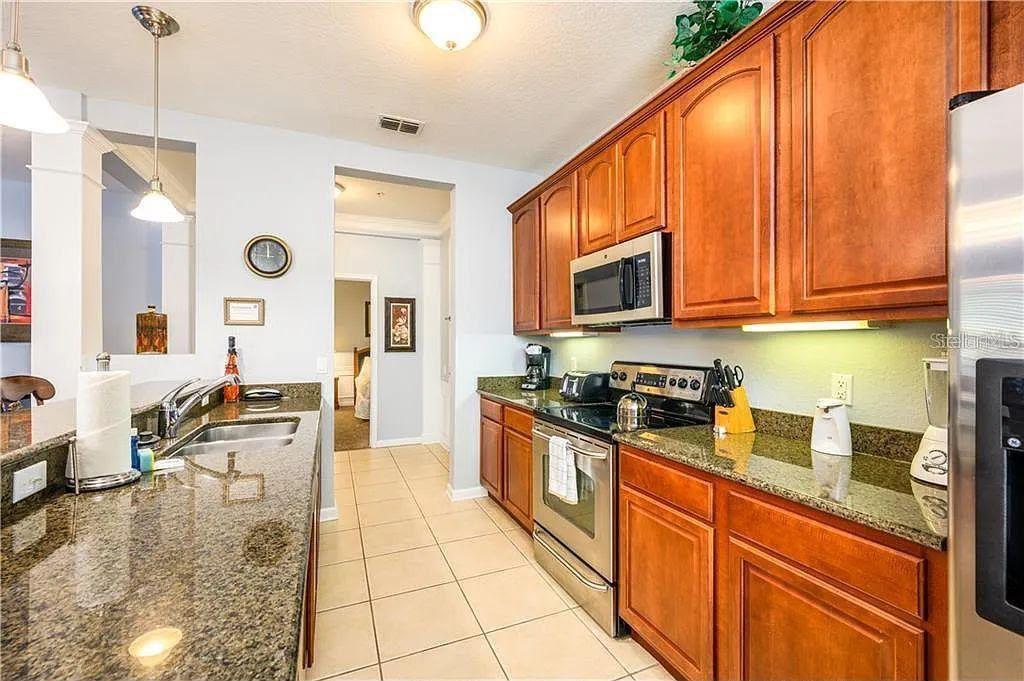 Photo of 5037 Shoreway Loop #10602, Orlando, FL 32819 (MLS # O6446943)
