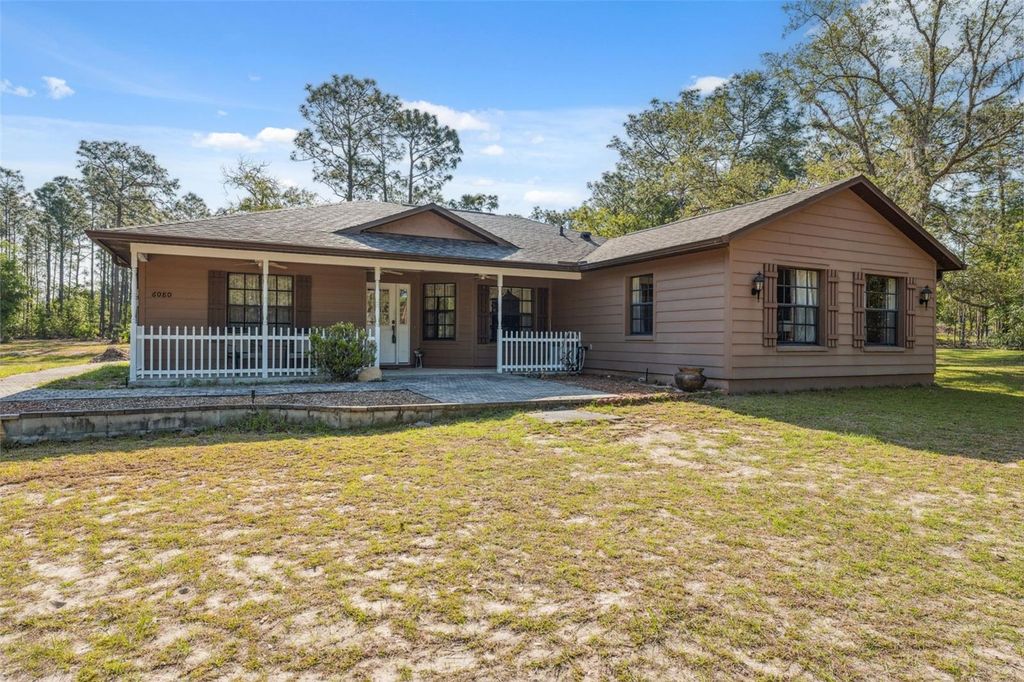 Photo of 6080 Dexter Lane, Brooksville, FL 34602 (MLS # W7874849)