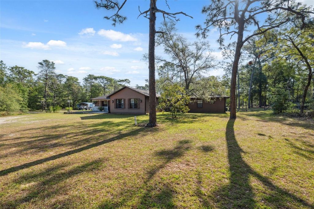 Photo of 6080 Dexter Lane, Brooksville, FL 34602 (MLS # W7874849)