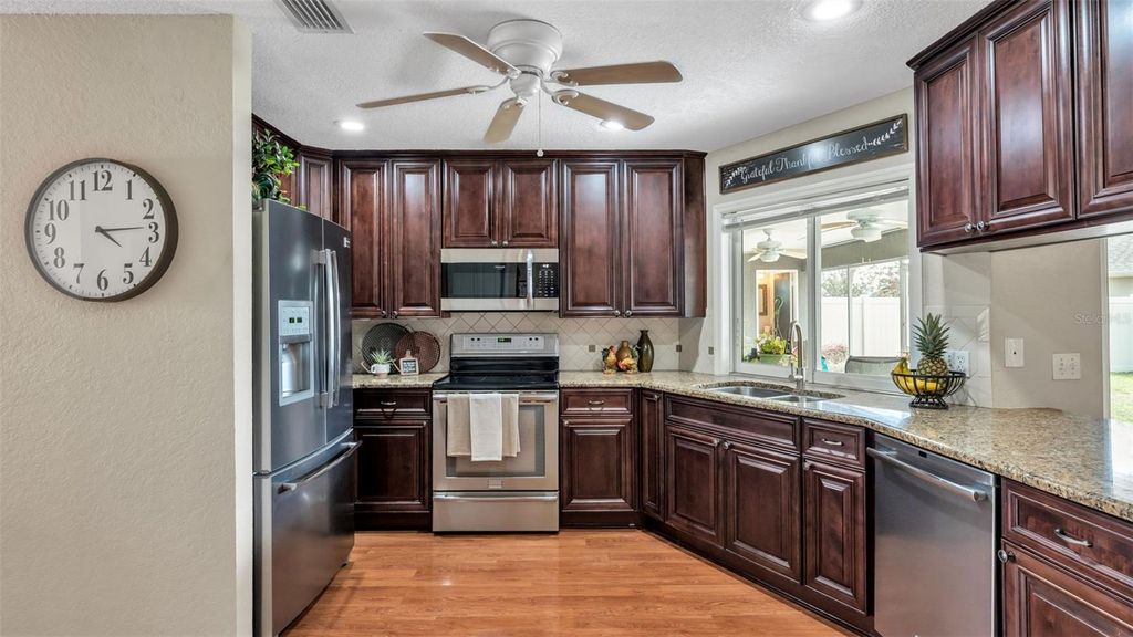 Photo of 538 Powder Horn Row, Lakeland, FL 33809 (MLS # L4960468)