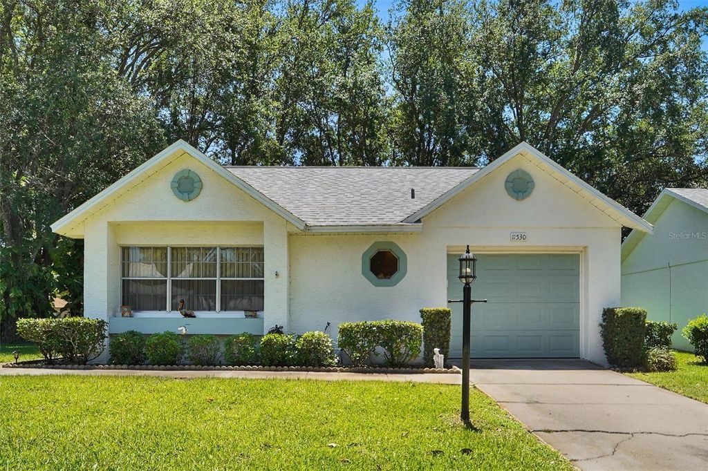 Photo of 11530 San Remo Court, Port Richey, FL 34668 (MLS # W7885875)