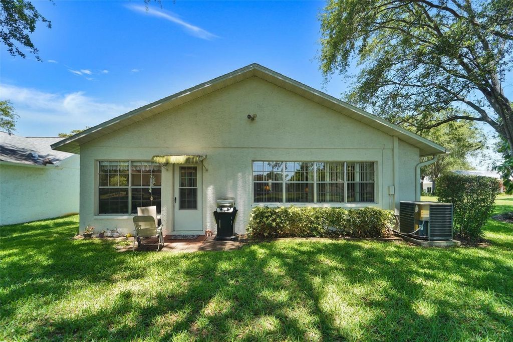 Photo of 11530 San Remo Court, Port Richey, FL 34668 (MLS # W7885875)