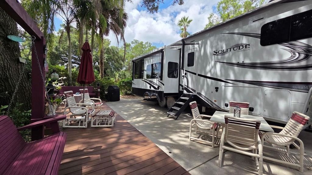 Photo of 173 Appaloosa Trail, River Ranch, FL 33867 (MLS # TB8405927)