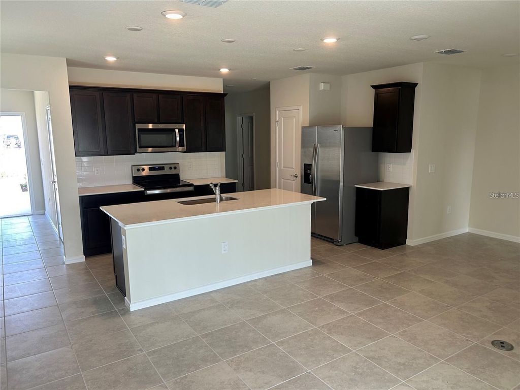 Photo of 1970 Enchanting Court, Davenport, FL 33896 (MLS # OM718887)