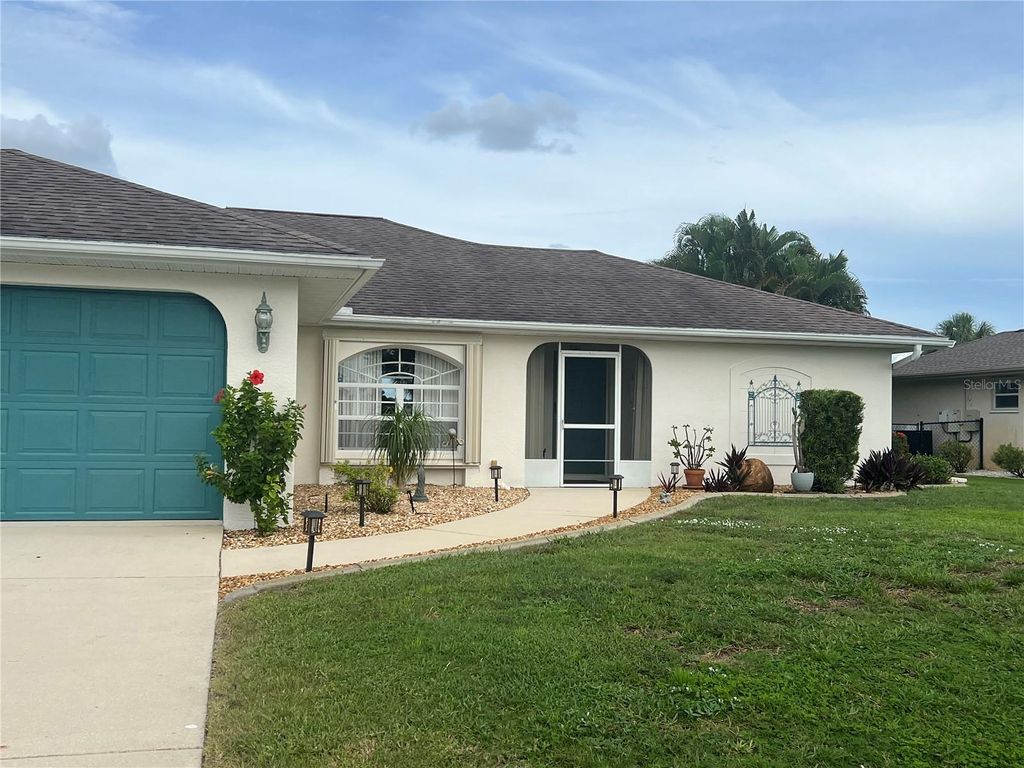 Photo of 1126 Waterside Street, Port Charlotte, FL 33952 (MLS # C7512817)