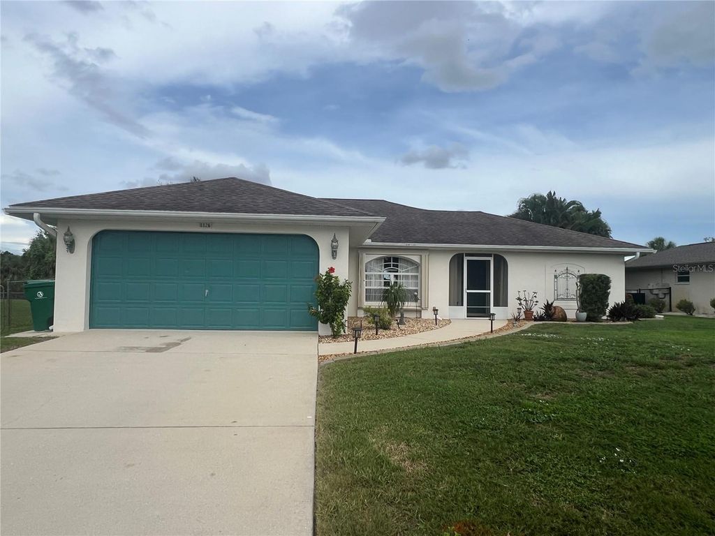 Photo of 1126 Waterside Street, Port Charlotte, FL 33952 (MLS # C7512817)