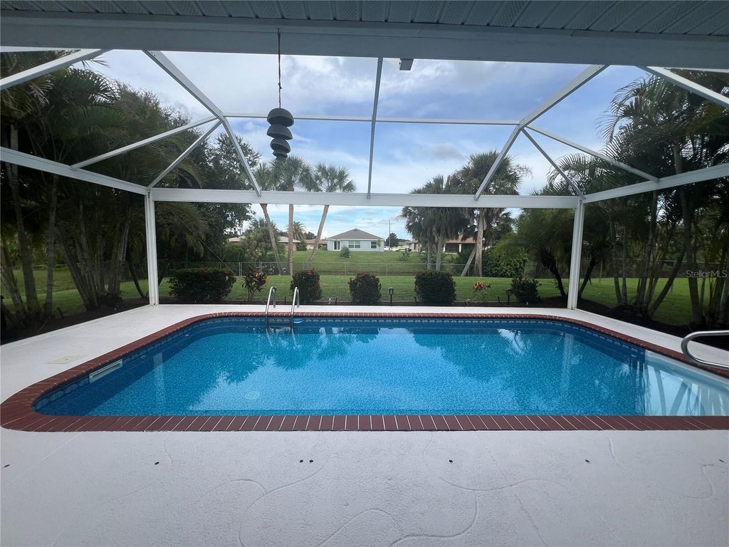 Photo of 1126 Waterside Street, Port Charlotte, FL 33952 (MLS # C7512817)