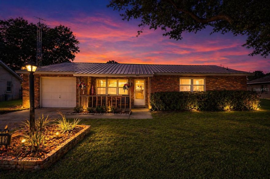 Don't wait to come see this move in ready home! 
This  2-bedroom, 2-bath residence with a flexible den offers nearly 1,900 square feet of solid brick construction, thoughtfully updated interiors, and outdoor spaces designed for real Florida living.
Constructed of solid brick and offering nearly 1,900 square feet, this residence has been carefully updated to reflect modern comfort while preserving its original character. 
imagine mornings beginning on the covered front porch—coffee in hand. 
 As you step inside, the interiors unfold with intention—warm wood flooring leads thru a  light-filled
living space that opens from the living room into a reimagined kitchen  with an eat-in area , where clean-lined white cabinetry, stainless steel appliances, and a refined hex tile backsplash create a space that feels both functional and refined.

The adjacent dining area is anchored by an original brick fireplace, complemented by a reclaimed wood chandelier that adds depth and character. Off the dining room an enclosed sunroom offers year-round flexibility and extends the living experience, offering flexibility for private retreat, guest accommodation, or media space.

Outdoors, the property transitions seamlessly into a fully fenced backyard designed for both relaxation and entertaining. A curated mix of patio, deck, pergola, and fire pit creates layered outdoor living, with ample space to further enhance—whether with a pool, garden, or additional storage for recreational assets.

Recent improvements, including a 2023 metal roof, updated electrical panel, fresh interior finishes, and full kitchen and bath renovations completed in 2025, position this home as a turnkey opportunity.

A property defined not by excess, but by thoughtful execution and everyday ease.