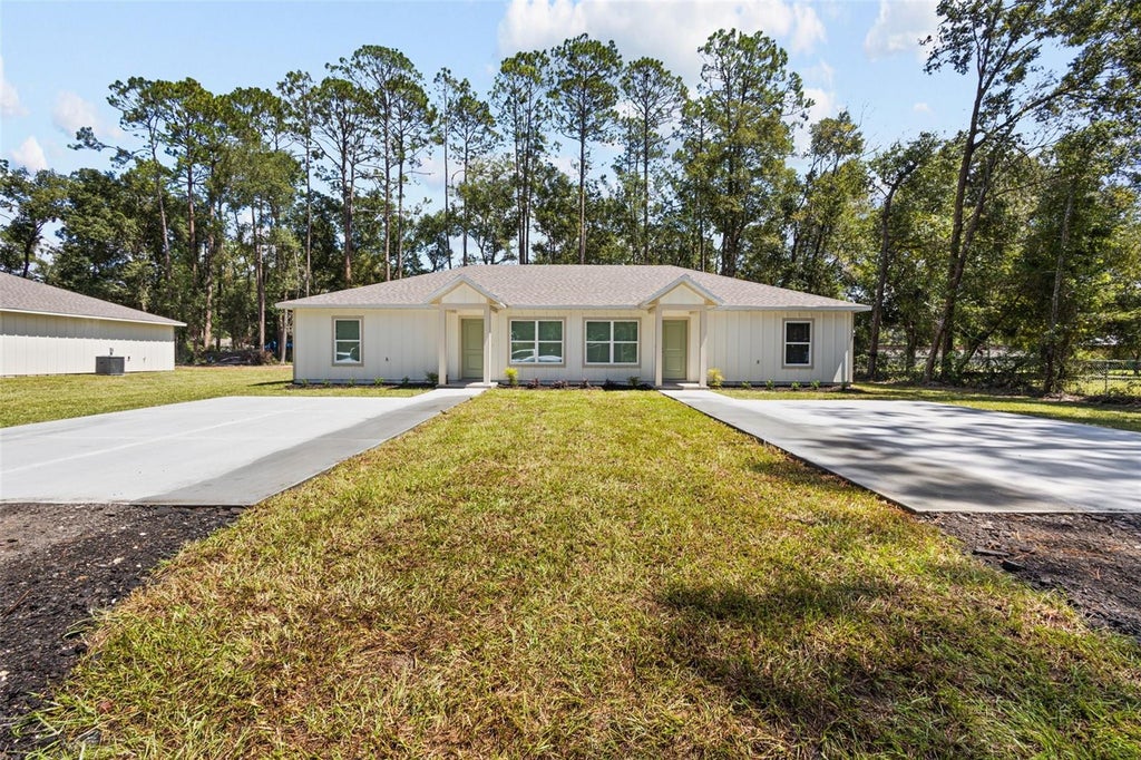 Photo of 105 NW 8th Street, Chiefland, FL 32626 (MLS # OM732204)