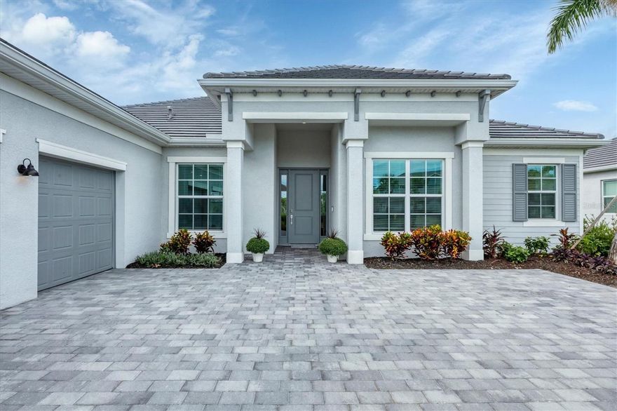 *** GOLF DEEDED!!! Stately and stunning, this Napoli II model, estate home is located in the premier, resort-style community of Wellen Park Golf & Country Club, with a deeded golf membership—just pay a cart fee to play! Situated on a premium private lot with serene nature preserve views and nestled on a quiet street, this 4BR/2.5BA residence offers the ideal blend of elegance, comfort, and low-maintenance living. Enjoy impact-rated windows and sliding glass doors for your peace of mind, wood-look ceramic tile flooring, soaring ceilings, and a spacious 3-car side-load garage. The open-concept layout flows seamlessly from the chef’s kitchen—featuring quartz countertops, custom cabinetry, and high-end appliances—into generous living and dining areas. Pocket sliders lead to a beautiful outdoor oasis with a heated pool and spa, perfect for entertaining or relaxing in private.  The serene and relaxing primary suite is a true retreat with an abundance of space with a reading nook, and a clear view French door leading to your luxurious pool and have blinds between the glass for privacy, and an ensuite bathroom just steps away. The spa-like bathroom includes a soaking tub, large shower, and dual vanities. The 4th bedroom is an added bonus with double French doors which can also be used as den or home office. Two additional guest bedrooms are thoughtfully separated for privacy, ideal for when friends and family come to visit! Living in Wellen Park Golf & Country Club means enjoying resort amenities, including an 18-hole Gordon Lewis-designed golf course, heated community pool, tennis, pickleball, bocce, tiki bar, salon, spa, state-of-the-art fitness center, dog park, social events, and miles of walking/biking trails. Low HOA dues include your golf membership, gated access, lawn maintenance, irrigation water, cable, and internet.  Wellen Park Golf & Country Club offers a vibrant lifestyle with world-class amenities, Located just minutes from downtown Wellen Park include dining, shopping, concerts, yoga on the great lawn, and CoolToday Park, home of the Atlanta Braves spring training. Venice’s pristine beaches and historic downtown are just 20 minutes away. Enjoy the ultimate Florida lifestyle with peace, tranquility, and world class amenities all in a maintenance-free, gated community. Just bring your bathing suit—this executive home is ready for you! NOTE: CDD fee is included in the taxes, and your golf membership is included in your HOA dues. HOA fee also includes basic cable and internet. Welcome Home to Wellen Park Golf & Country Club—where every day feels like a vacation! *** Wellen Park Golf & Country Club will not be selling anymore golf memberships. They are sold out of houses/homesites with the golf deeded memberships. DON'T LET THIS FABULOUS OPPORTUNITY PASS YOU BY!