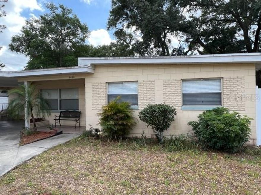 Accepting Backup Offers. Location! Location! Welcome to this unique opportunity to make this charming 1960, well built block home with 3 bedrooms and 2 baths your own! Located in a desirable area of Conwway with no HOA! This property is ready for you to customize and make it your own.  This home sits on a large fully fenced corner lot offering plenty of room to grow, maybe add a pool, park your boat and build a garage. The master bedroom also has its own entrance and could be used as a mother-in-law suite. There are laundry hook-ups located inside the kitchen as well as in the outside utility room providing you with the option of adding a pantry or a great workshop under the carport for all your projects. Recent updates include a new AC and hot water heater in 2020-21. The kitchen and guest bath have been remodeled including a great step-in shower and tile throughout the home. 
You'll love living close to all the amenities of Conway including downtown Orlando, shopping, restaurants and highly rated schools (Boone High), while being only 3 miles from Orlando International Airport. Don't wait any longer - come see what potential awaits you at this one-of-a-kind property today!