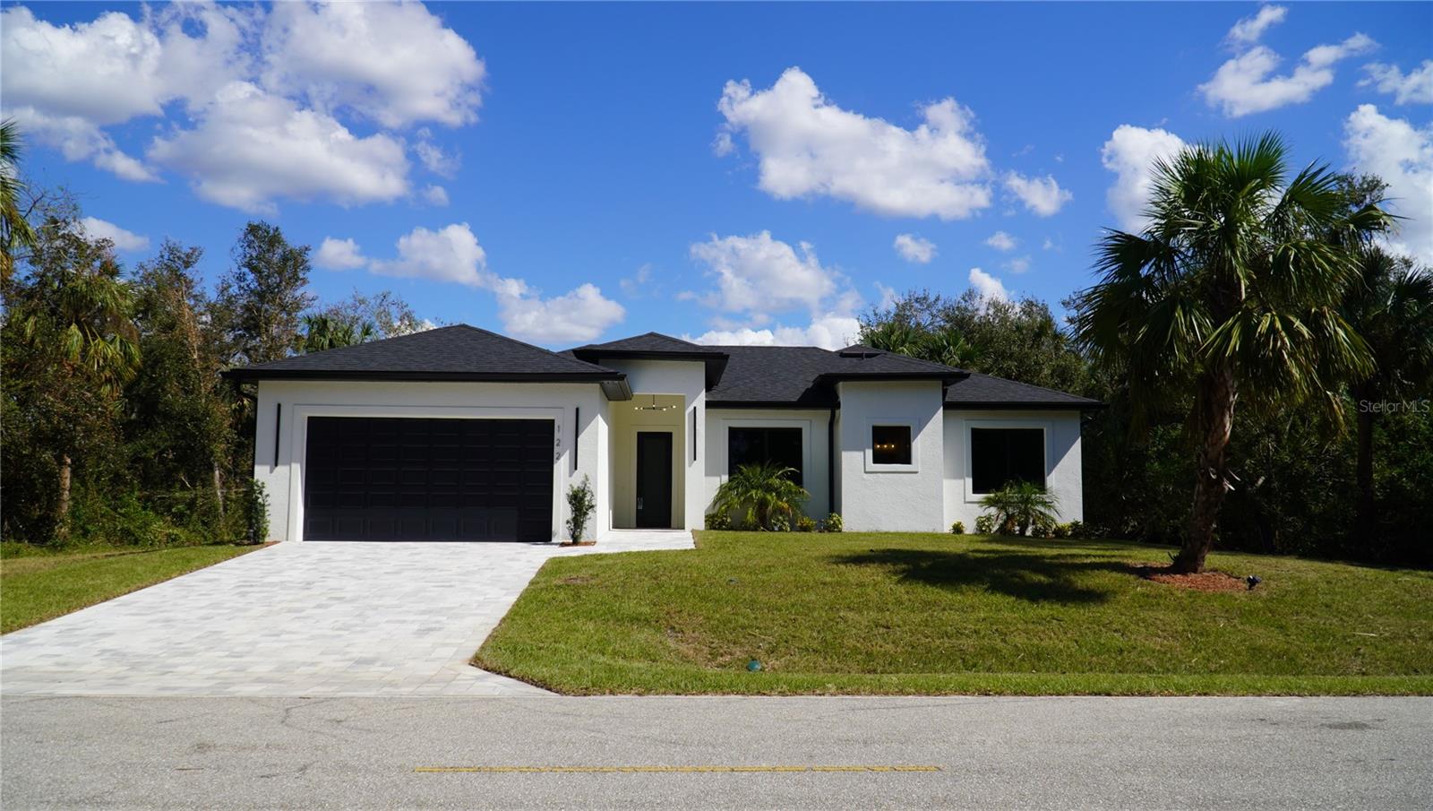 Modern Canal-Front Home with High-End Finishes – Priced in the Low $400s
Looking for a beautifully finished new home at a great value? Welcome to 249 Pembroke Dr — a 4-bedroom, 3-bathroom home offering modern style, quality craftsmanship, and peaceful freshwater canal views — all in a quiet neighborhood of Port Charlotte.
Step inside to a bright, open floor plan with 10-foot ceilings, 8-foot interior doors, and a 16-foot sliding glass door that fills the space with natural light and opens to your private backyard with no rear neighbors.
The heart of the home is the stylish kitchen, featuring quartz waterfall countertops, custom cabinetry, and an open layout perfect for both entertaining and everyday living.
Each bedroom has its own custom closet and access to a bathroom — great for family or guests. The primary suite and one guest bedroom include upgraded built-in closet that adds both elegance and extra storage.
You’ll also find luxury vinyl plank flooring throughout, tile in the bathrooms, and hurricane-impact windows for safety, energy efficiency, and peace of mind.
All of this, priced in the low $400,000s, makes this home an exceptional value for buyers looking for high-end finishes at a smart price. Just a short drive to shopping, dining, schools, and Gulf Coast beaches.
Don’t miss your chance — schedule a private showing today!