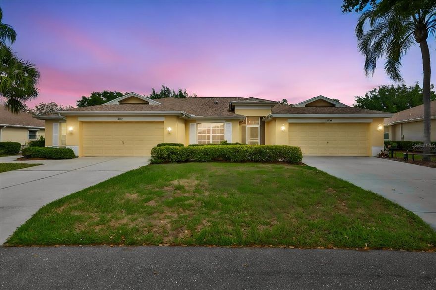 Welcome to 2249 Worthington Greens Dr., located in the highly desirable gated community of Kings Point in Sun City Center, Florida. This beautifully maintained Duke floor plan offers a maintenance-free lifestyle with two bedrooms, two bathrooms, a den/office, and a spacious two-car garage.
From the moment you arrive, you are greeted by an inviting screened front entry, creating a welcoming outdoor space while adding additional comfort and functionality. Inside, the home features gorgeous wood-look tile flooring throughout, high ceilings, crown molding, chair rail accents, plantation shutters, and an open split-bedroom floor plan designed for both comfort and entertaining.
The updated kitchen overlooks the great room and features quartz countertops, newer kitchen cabinet doors, a closet pantry, breakfast bar, eat-in dining space, and updated appliances including a 2025 dishwasher, washer, and dryer, along with a 2021 stove and refrigerator. The spacious great room flows seamlessly into the beautifully extended Florida room, which was opened to the main living area to create an expansive and airy floor plan filled with natural light. Enhanced with hurricane-impact windows and doors, this additional under-air living space brings the total functional square footage to approximately 1,985 square feet, while the tax records reflect 1,723 square feet.
The private primary suite offers a relaxing retreat with a beautifully updated en-suite bathroom featuring a brand-new shower and quartz countertops. The guest bedroom and guest bath are thoughtfully positioned on the opposite side of the home, with the guest bathroom also featuring quartz countertops, providing both style and comfort for visitors. The front den/office offers flexible space that can easily function as a home office, hobby room, or additional guest area.
Additional improvements include a 2025 hot water heater, driveway replacement in 2021, newly painted exterior, upgraded ceiling fans throughout, additional attic insulation, and hurricane-impact windows throughout the home. The garage includes built-in shelving and an EcoWater softener system.
Located in Kings Point, one of Florida’s premier active adult communities, residents enjoy access to resort-style amenities including indoor and outdoor pools, fitness centers, golf, tennis, pickleball, restaurants, clubs, entertainment, and countless social activities — all conveniently located near shopping, medical facilities, Tampa, Sarasota, and Florida’s beautiful Gulf Coast beaches.